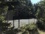 This property has its own tennis court Just across the street from the house